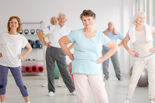 Group of active seniors exercising