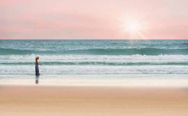 person-walking-beach-sunset