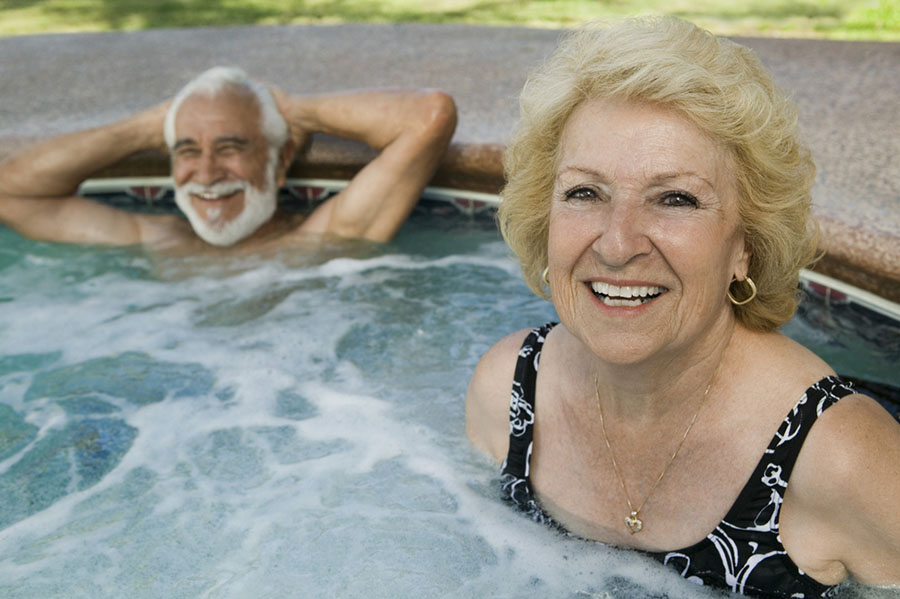 senior couple in hot tub