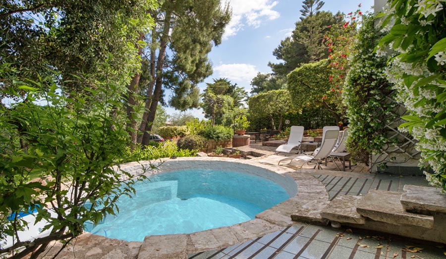 small pool in backyard close to sea