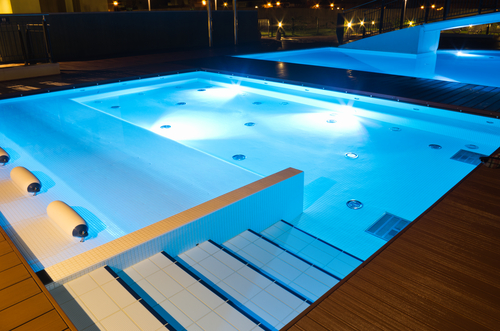 stairs in a small swimming pool at night