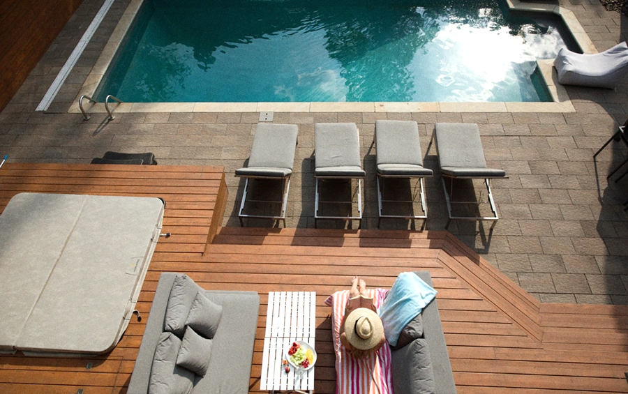 sunbathing backyard pool